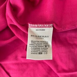 Burberry women’s hot pink polo
